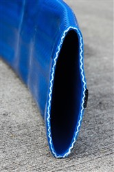 Click to enlarge - Extremely robust layflat hose designed for the most arduous conditions found in off-shore and bunkering applications.
Made from a very tough PU material and reinforced with high tensile polyester fibres, this hose is well suited to difficult working conditions. The hose can be fitted with two earthing wires contained within the black strap.